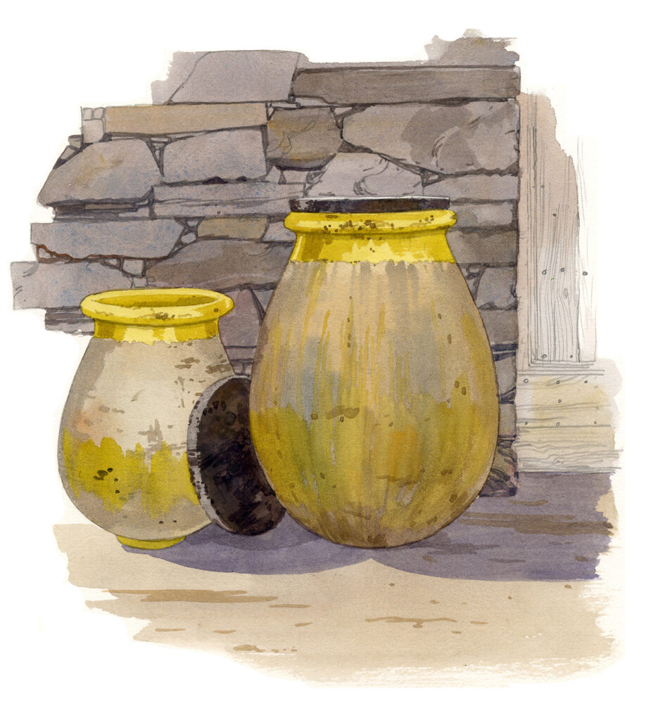 Asco. Deux jarres de Biot devant un mur de pierre